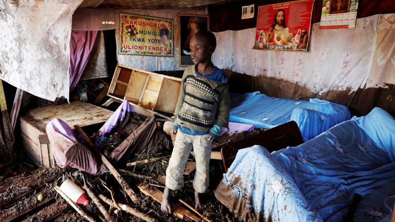 Boy in Homel Kenya Boy in Home damaged by flooding
